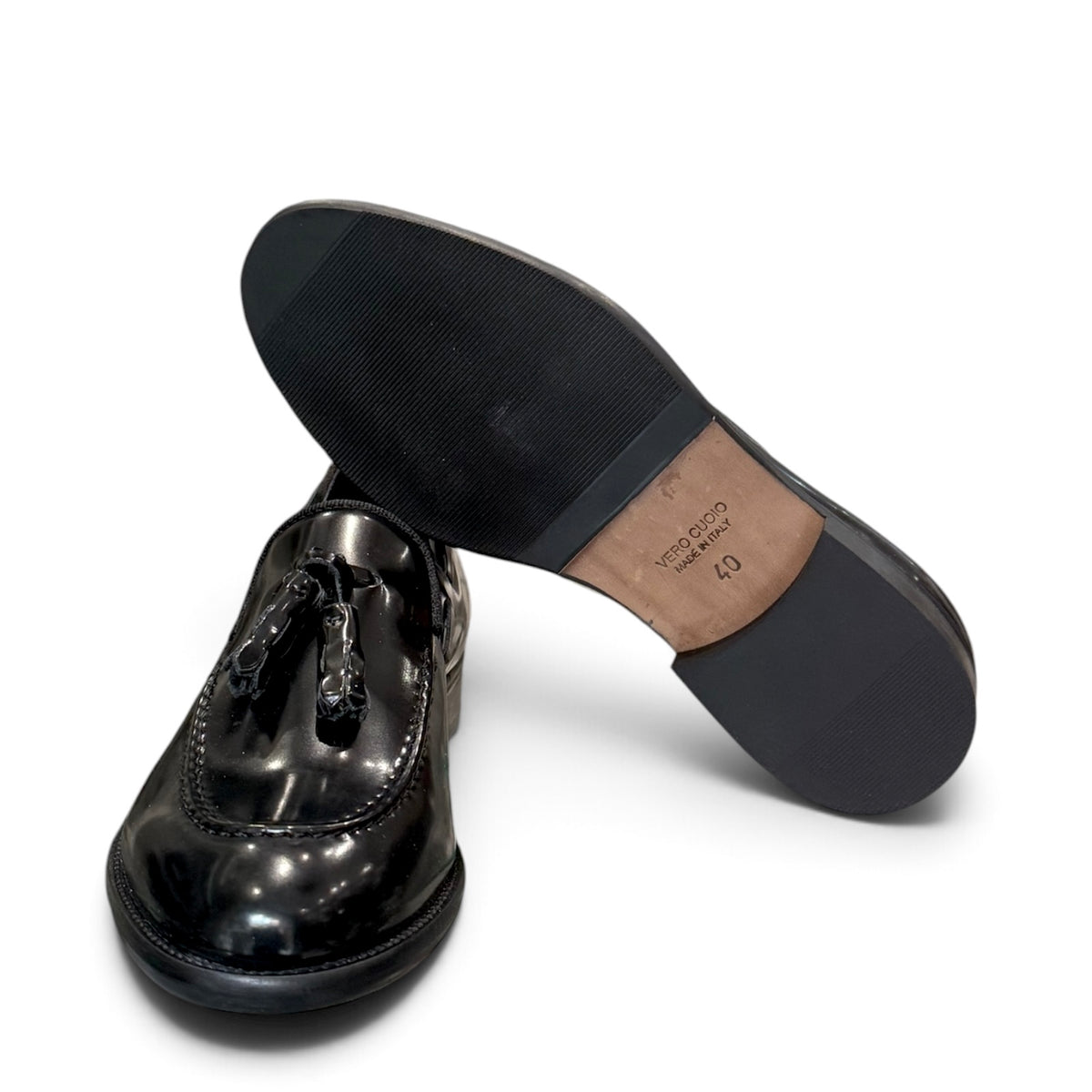 Moccasin with tassel in black brown leather