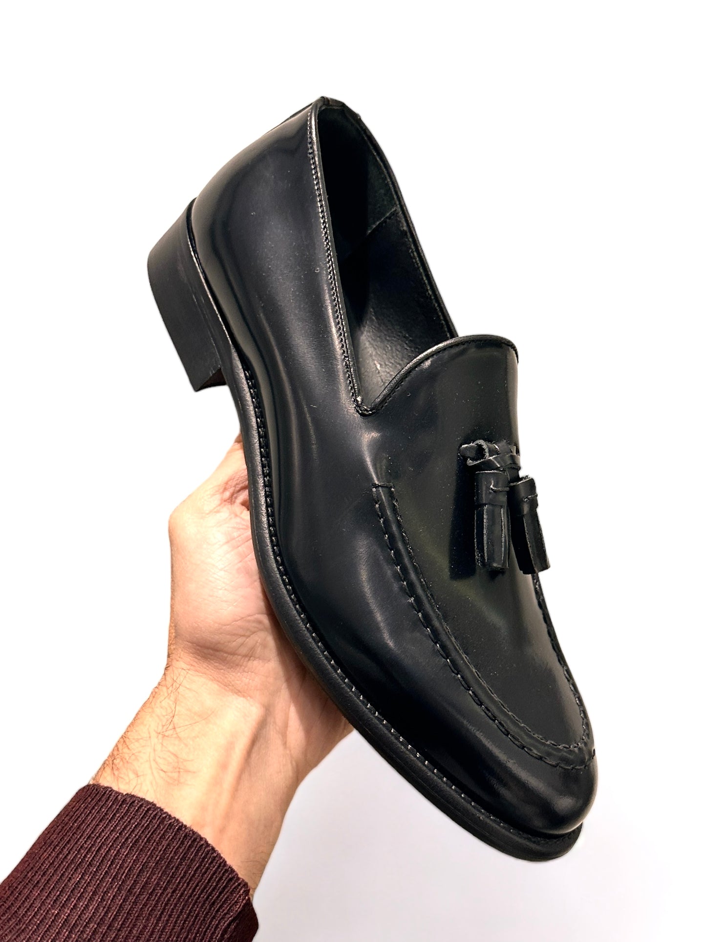 Moccasin with tassel in black brown leather