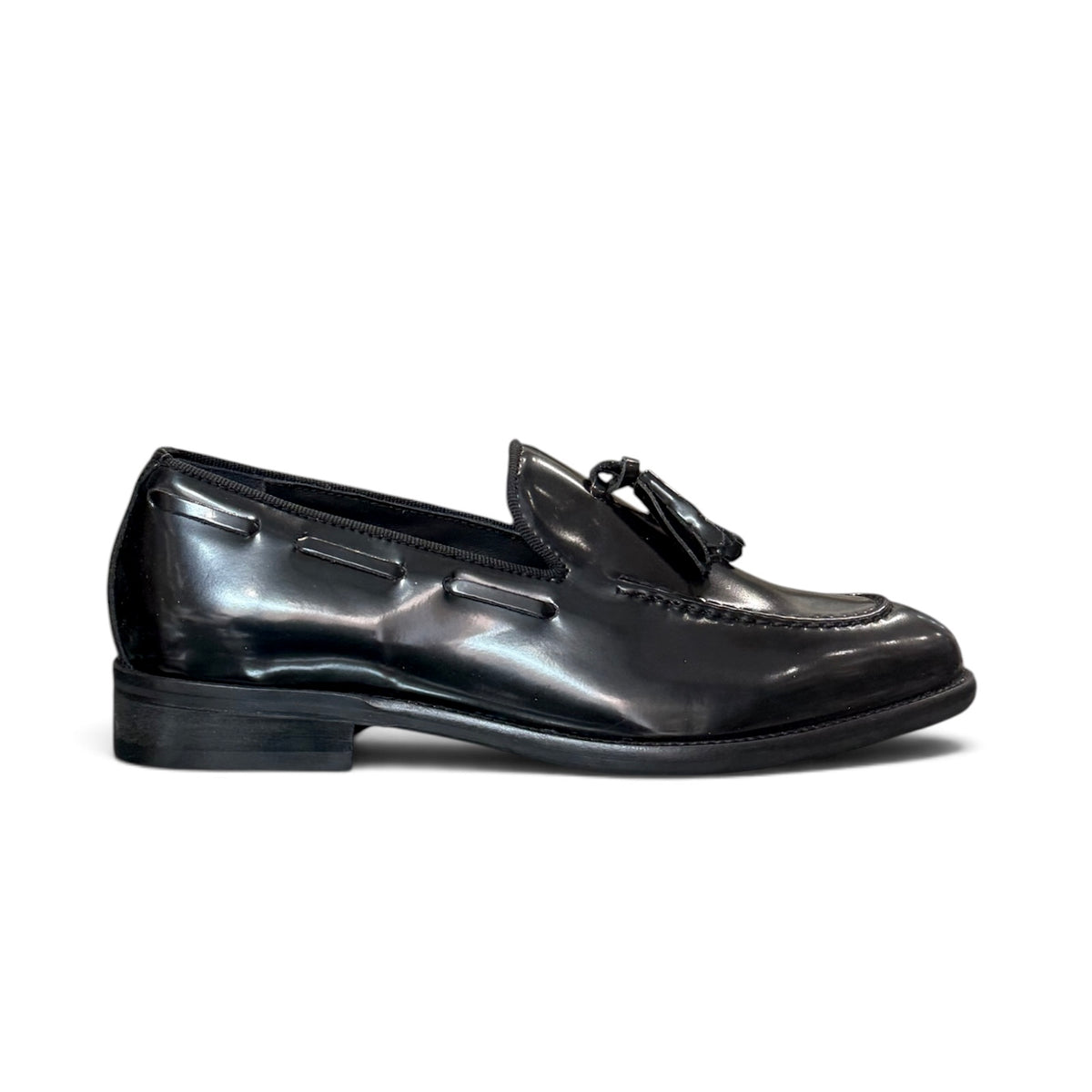 Moccasin with tassel in black brown leather